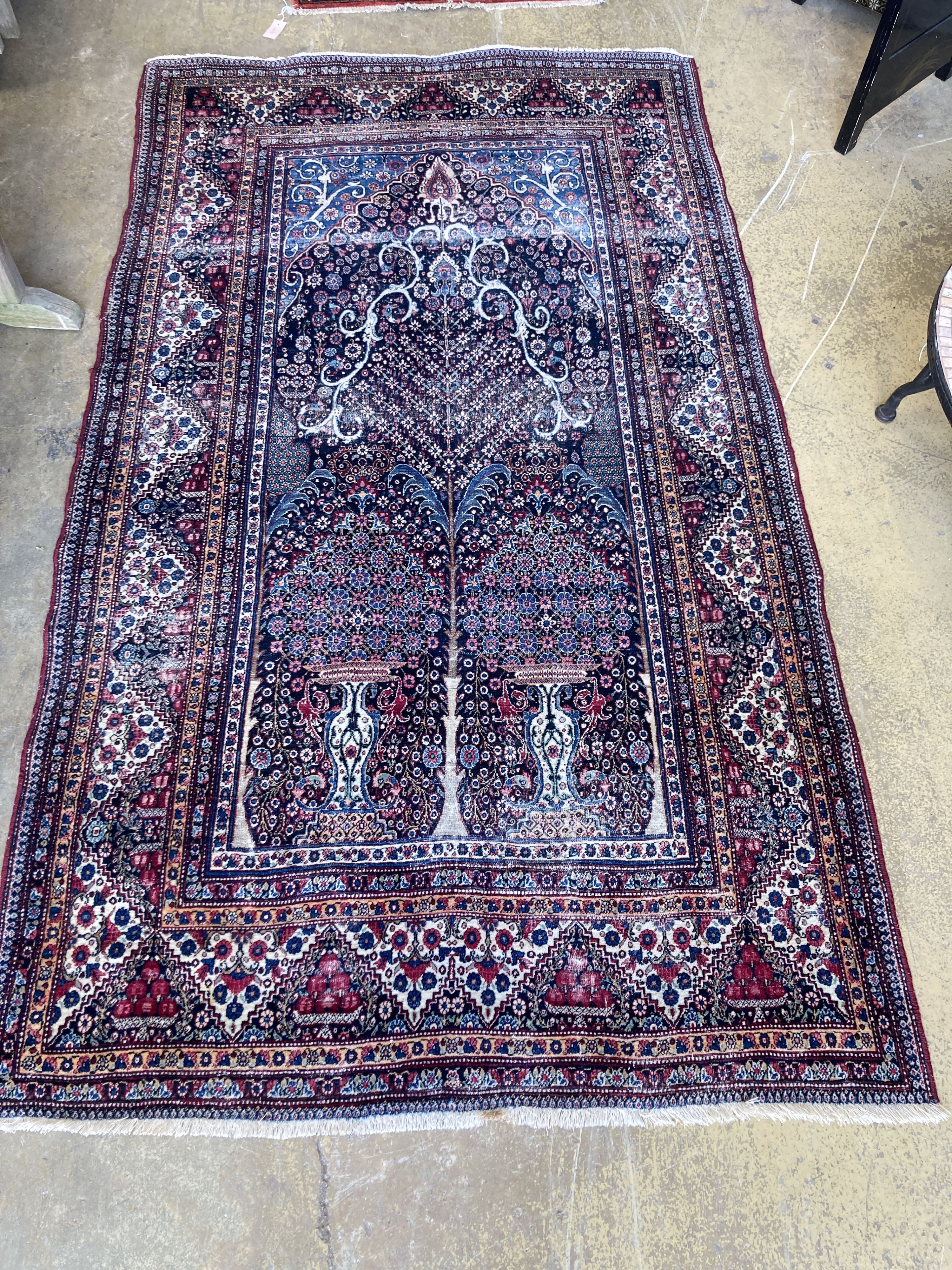An Isphahan blue ground rug, 248 x 140cm